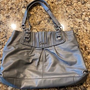 Grey Coach bag w/silver detail & purple interior